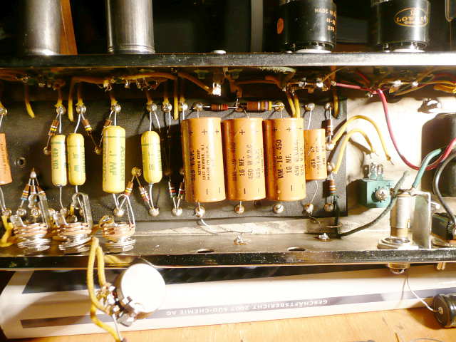 Original capacitors on board.